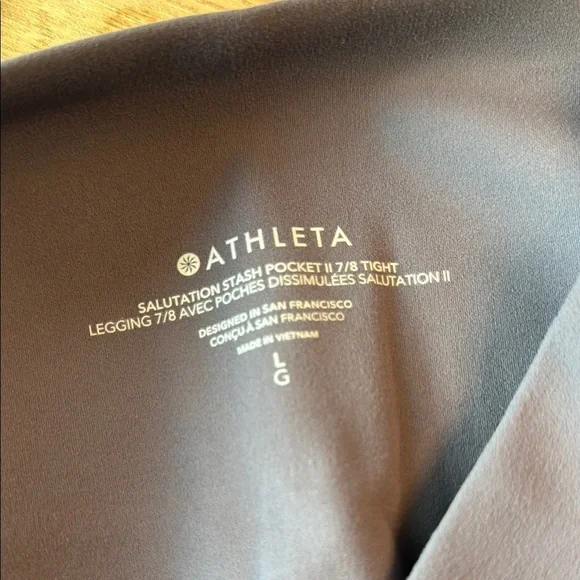 Athleta Salutation stash pocket II 7/8 Tight Leggings Size L - Picture 6 of 7